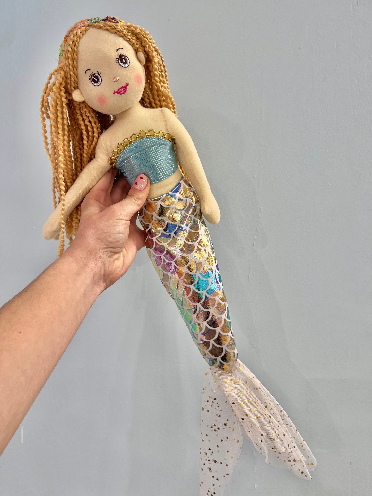 Pink mermaid with rainbow tail