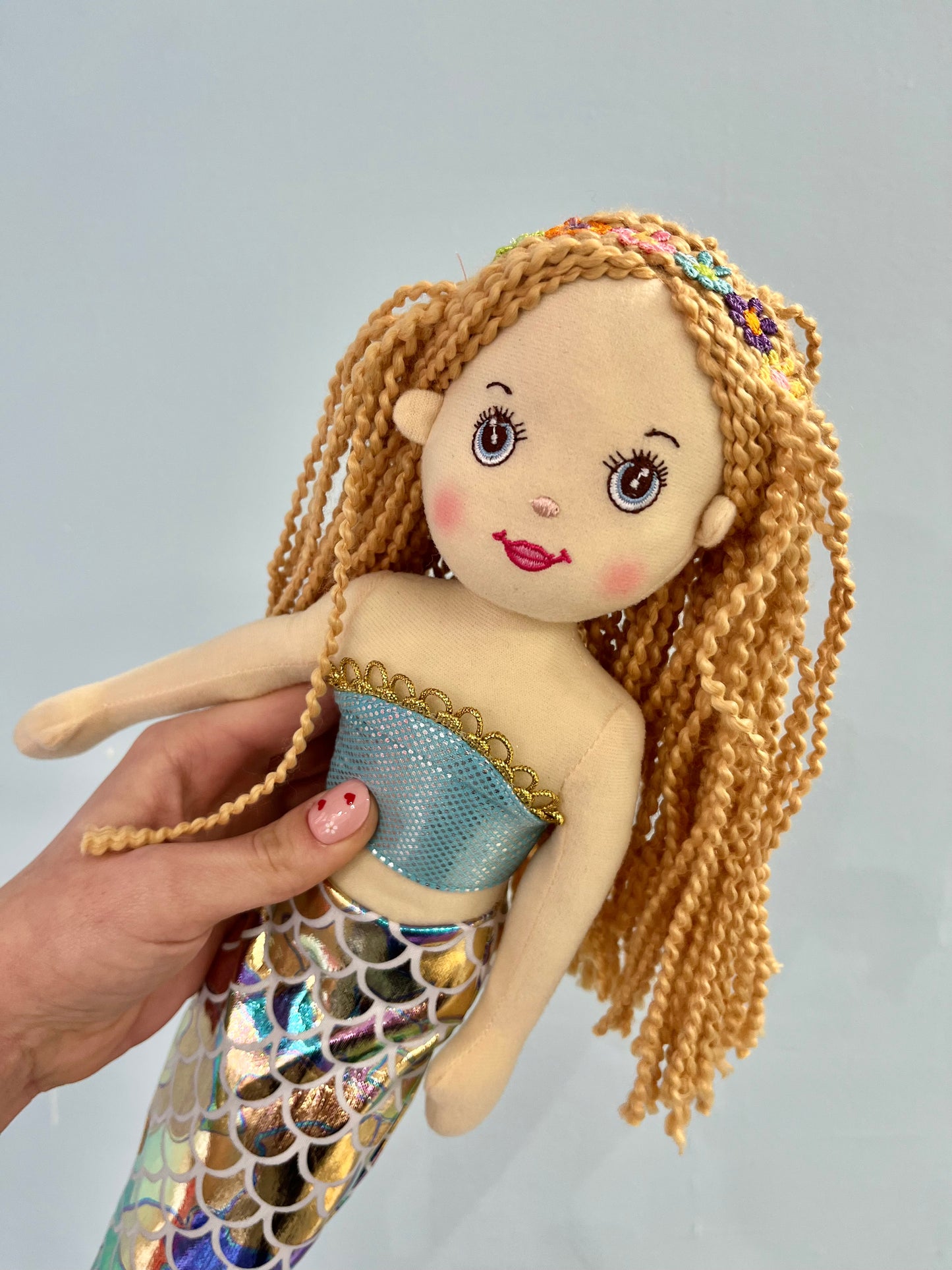 Pink mermaid with rainbow tail