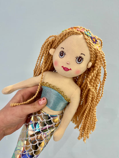 Pink mermaid with rainbow tail