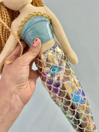 Pink mermaid with rainbow tail