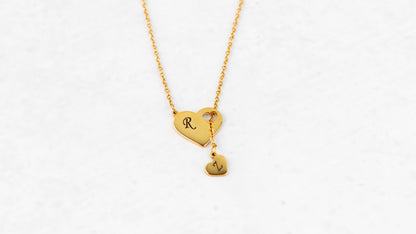 Gold heart necklace with heart
