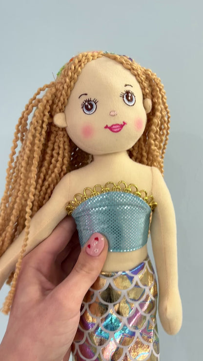 Pink mermaid with rainbow tail